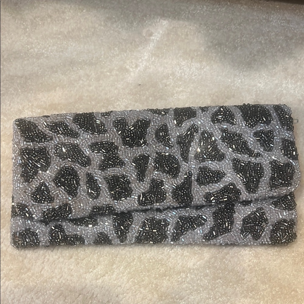 Black and Silver Animal Print Clutch with Luxurious Texture